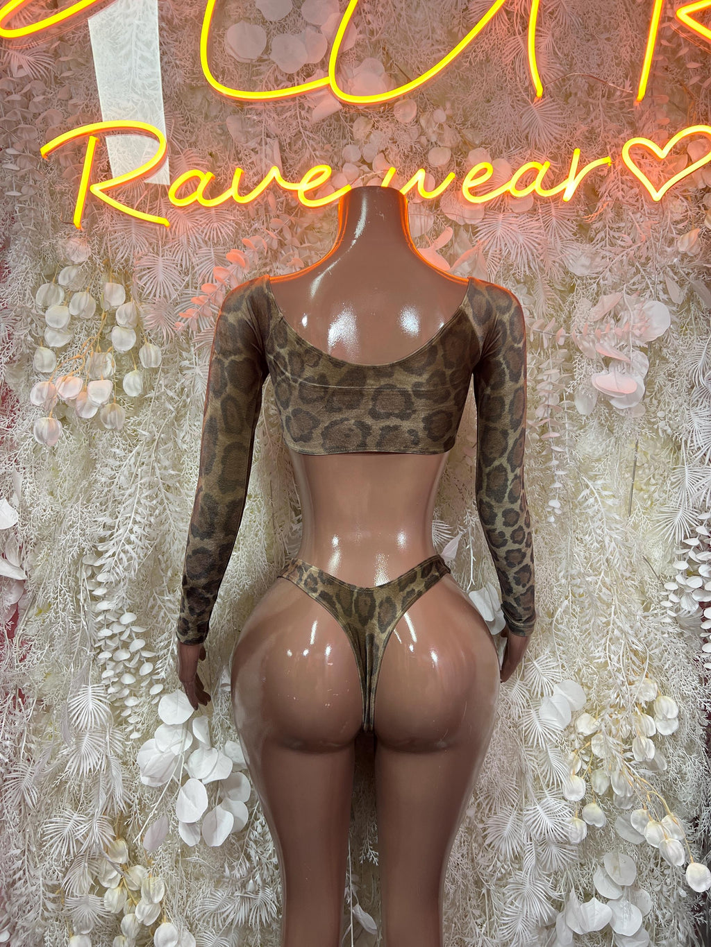 Snake-print long-sleeve cropped bodysuit with sweetheart neckline and high-cut bottom