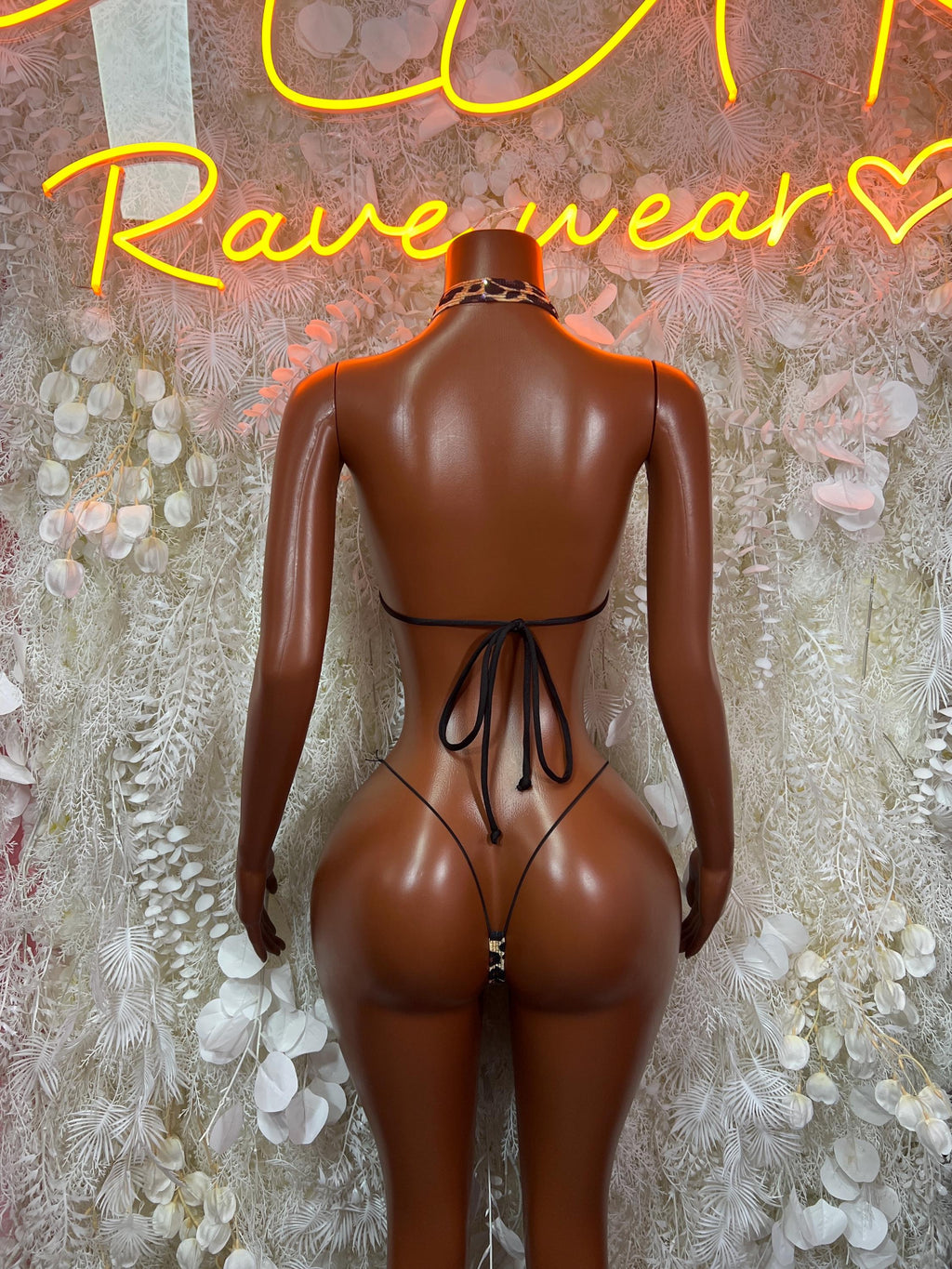 Leopard print bikini with halter backless top and lace-up back thong bottoms