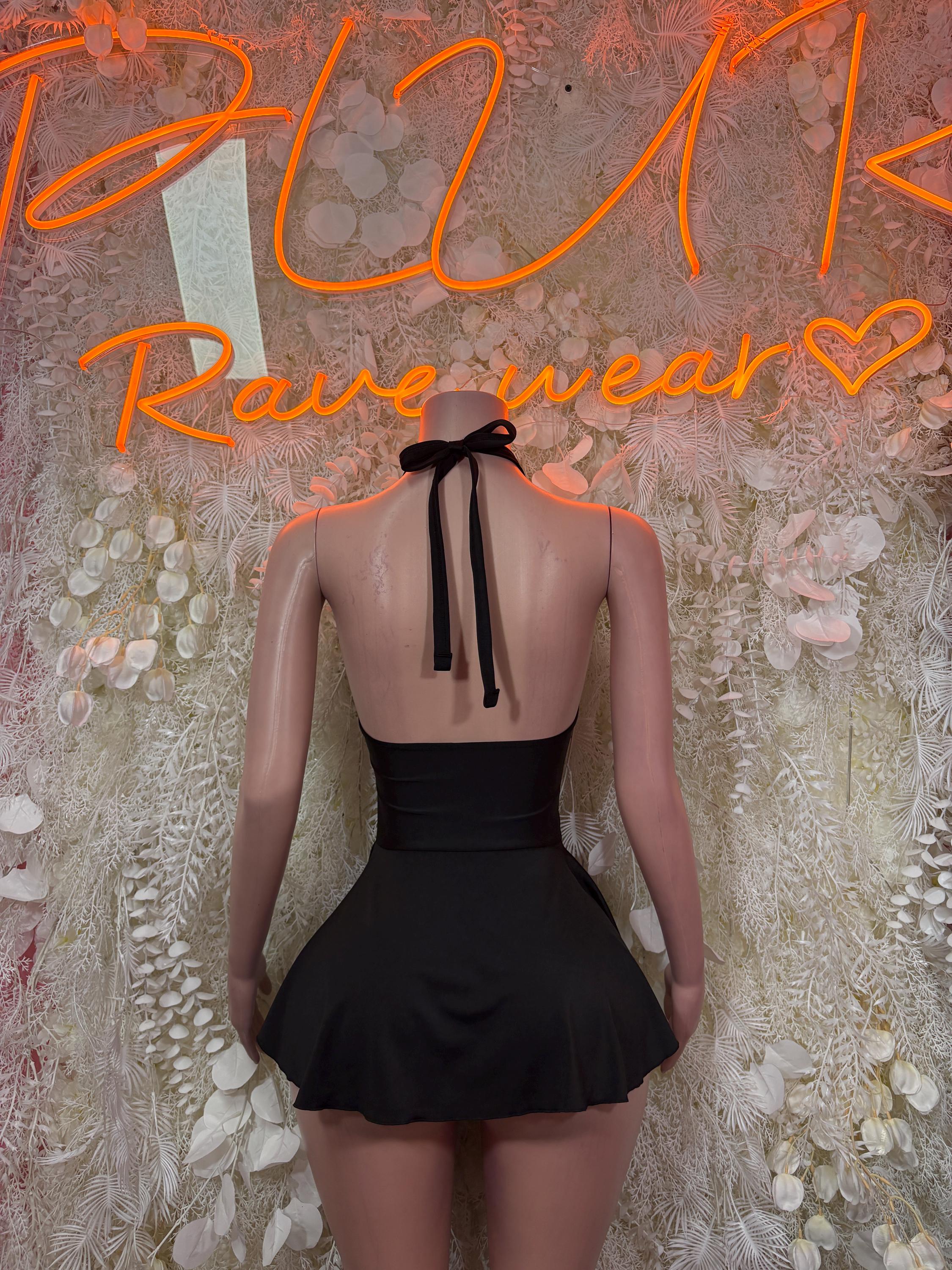 Black open-back sleeveless dance dress with ribbon tie and flared mini skirt