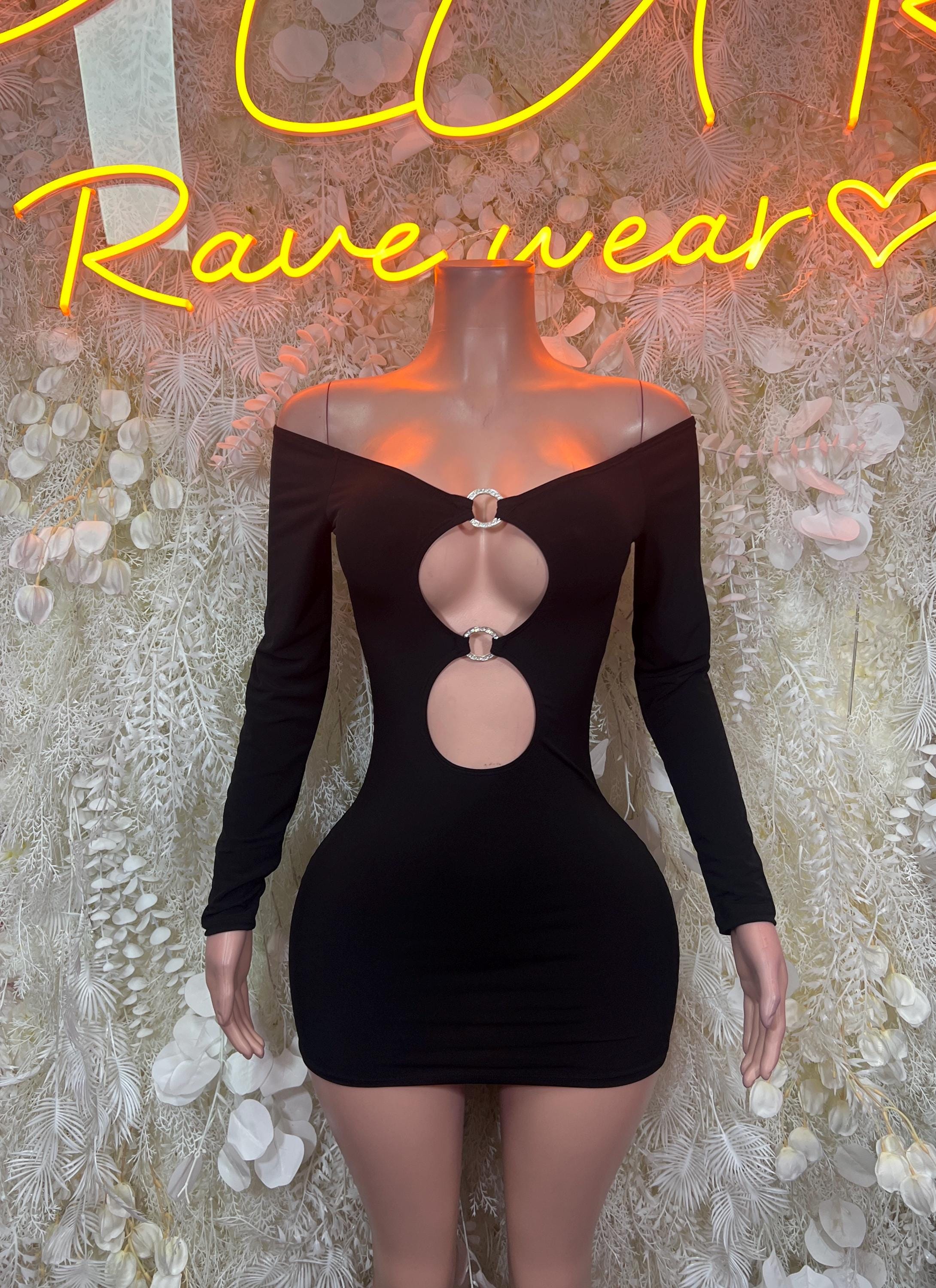 Black long-sleeve bodycon dress with central oval cutout and ring detail