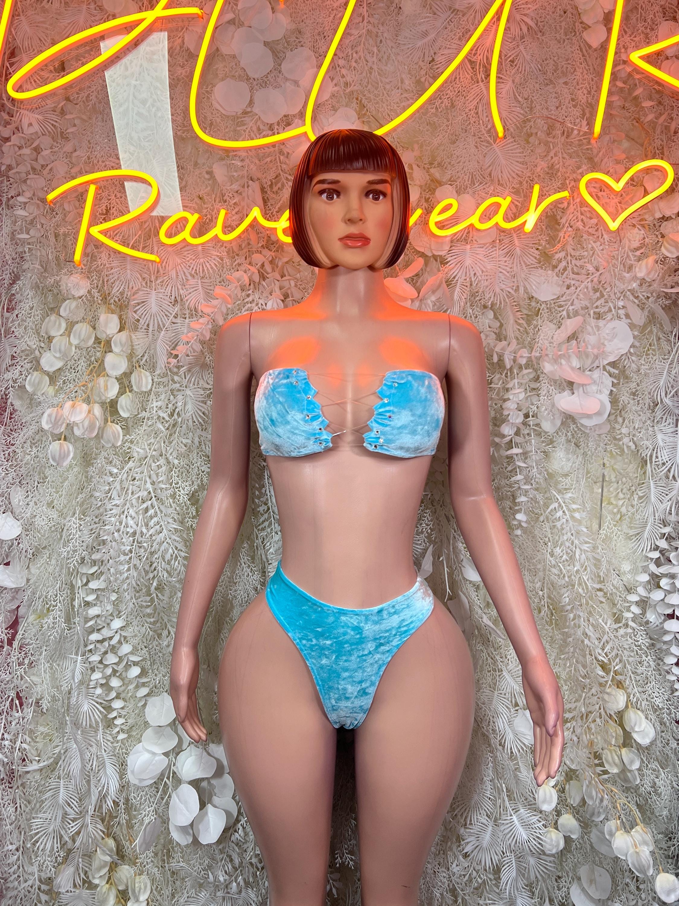 Light blue two-piece bikini set with sparkly bandeau bra and high-cut bottoms