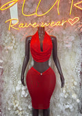 Red one-piece rave dress with draped cowl neckline and fitted pencil silhouette