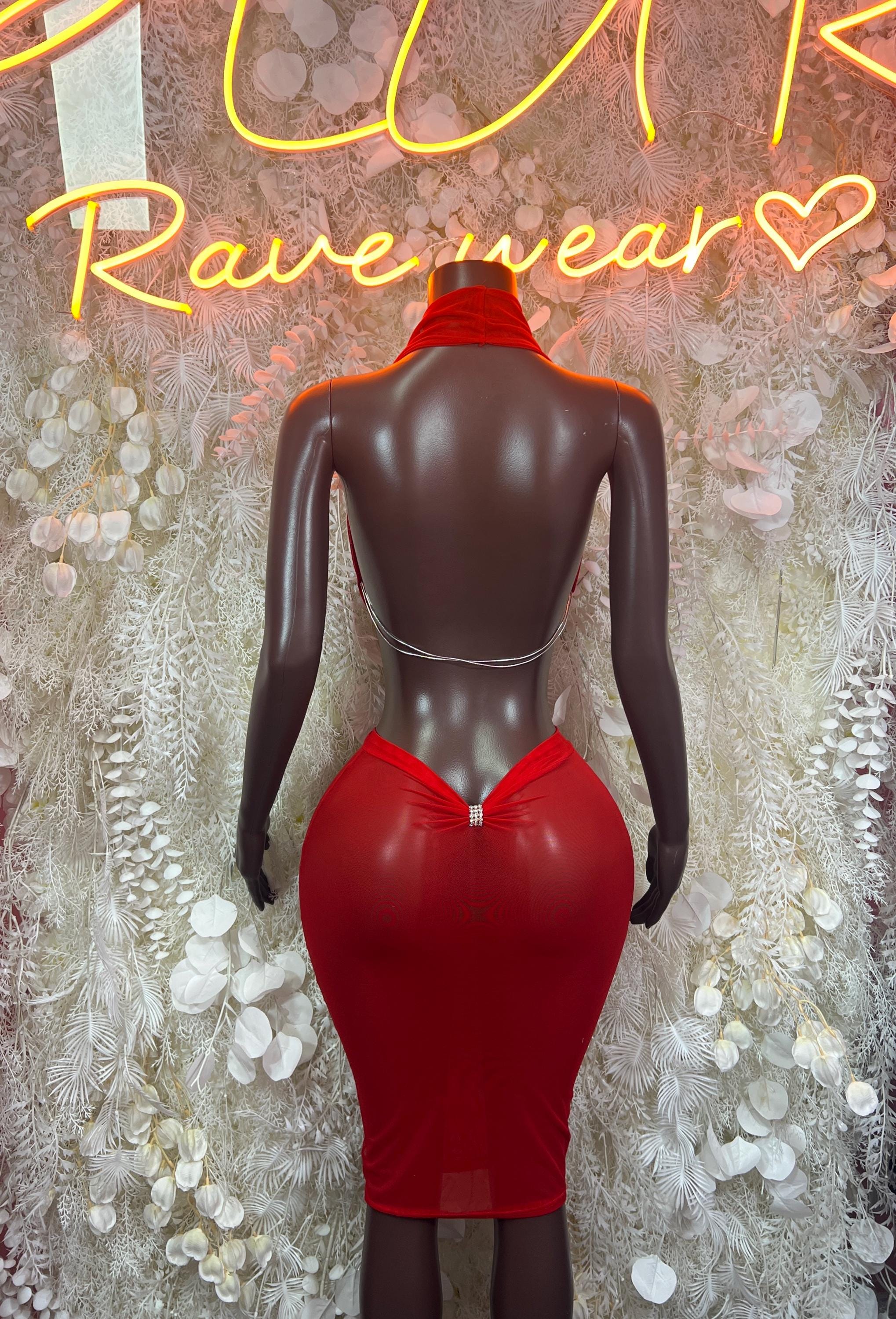Red one-piece rave dress with open back, draped cowl neckline, and fitted pencil fit