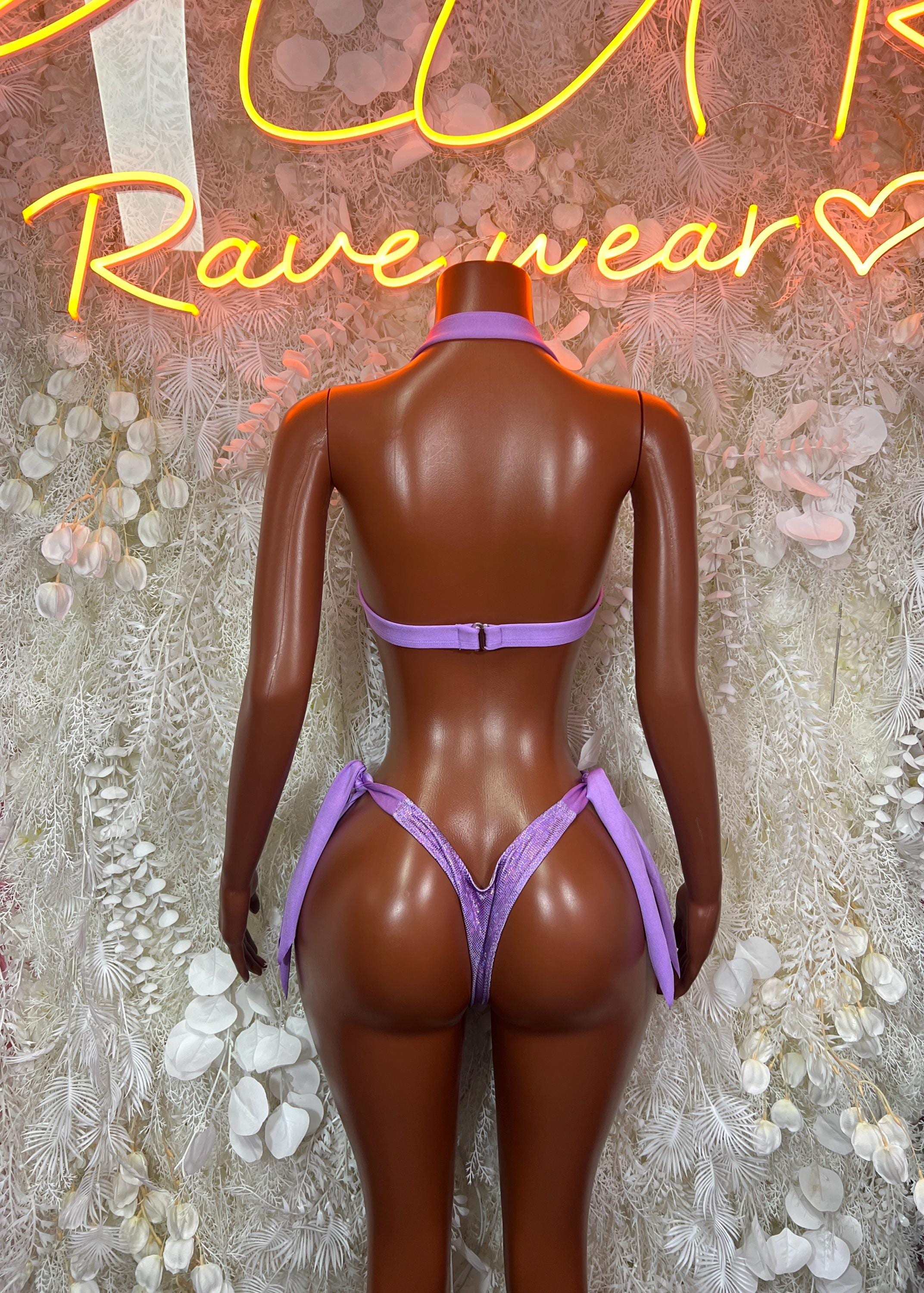 Purple metallic bikini set with halter back strap and tie-side bottoms, back view