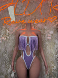 Purple halter rave bodysuit with white trim, fringe tassels at bust, front O-ring detail