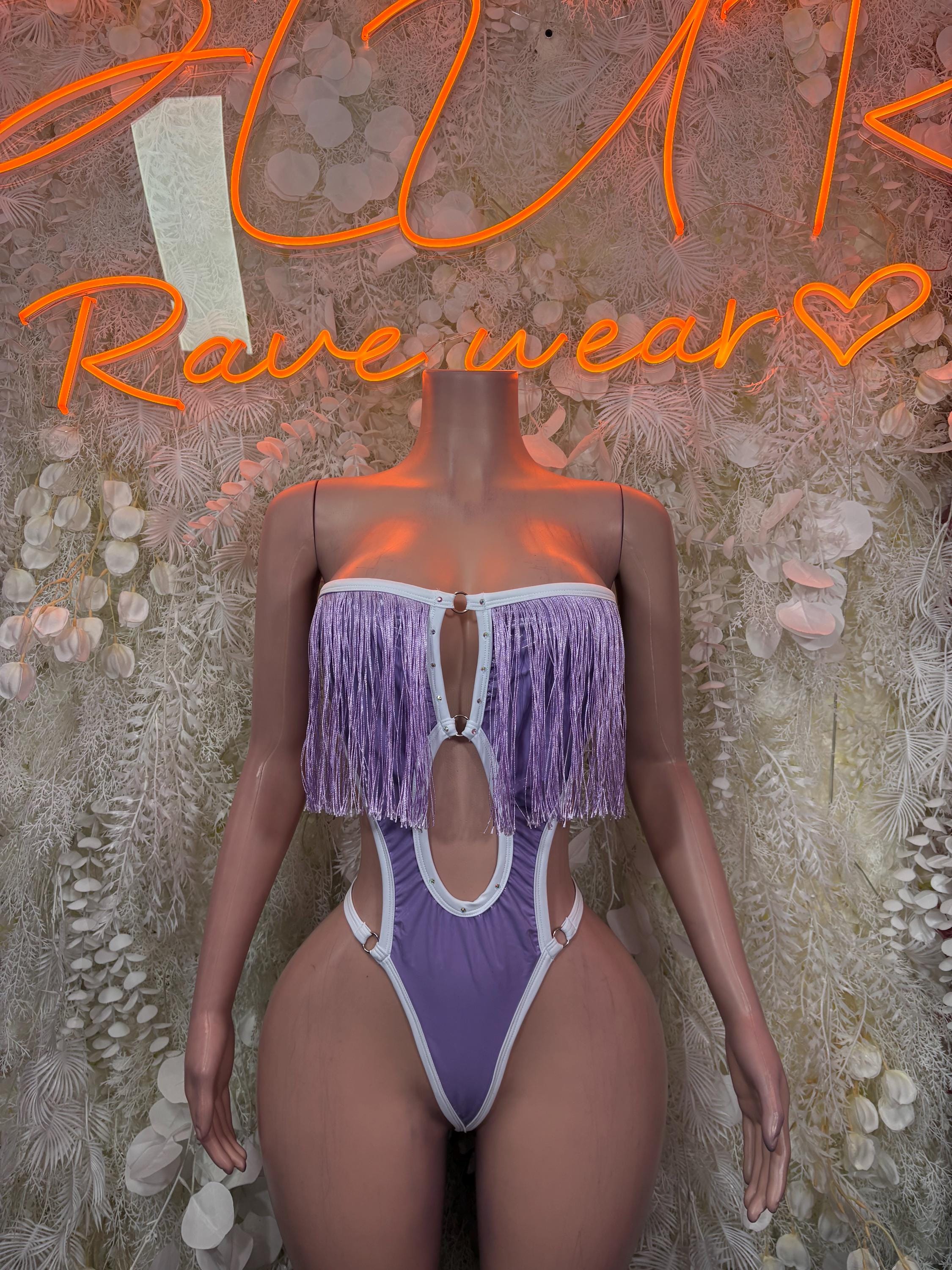 Purple halter rave bodysuit with white trim, fringe tassels at bust, front O-ring detail