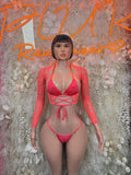 Coral two-piece dancewear set with long sleeves, lace bodice, and matching thong bottom