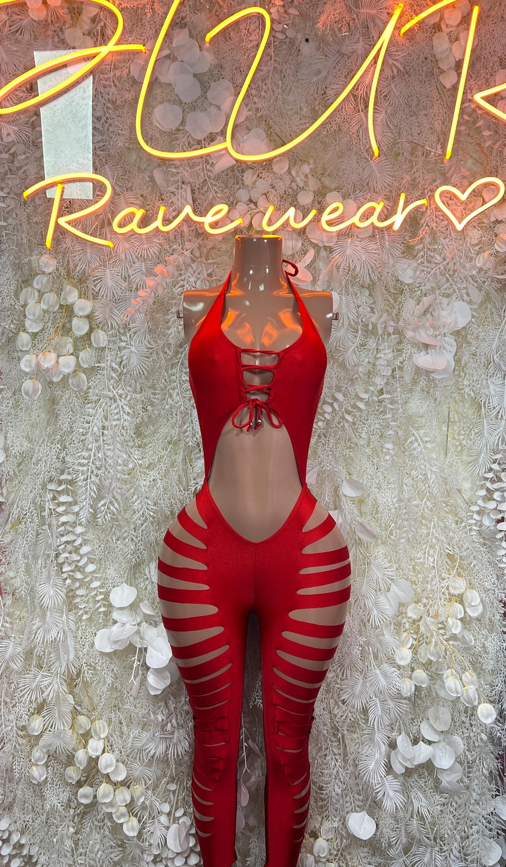 Red cutoff bodysuit with halter tie front and striped cutout hips