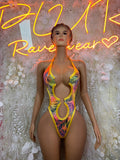 Tropical print halter one-piece bodysuit with yellow fringe and cutout chest
