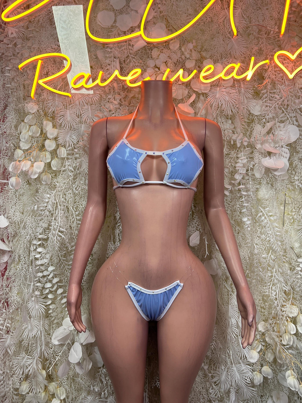 Light blue two-piece bikini with cutout triangle bra and lace-up bottom