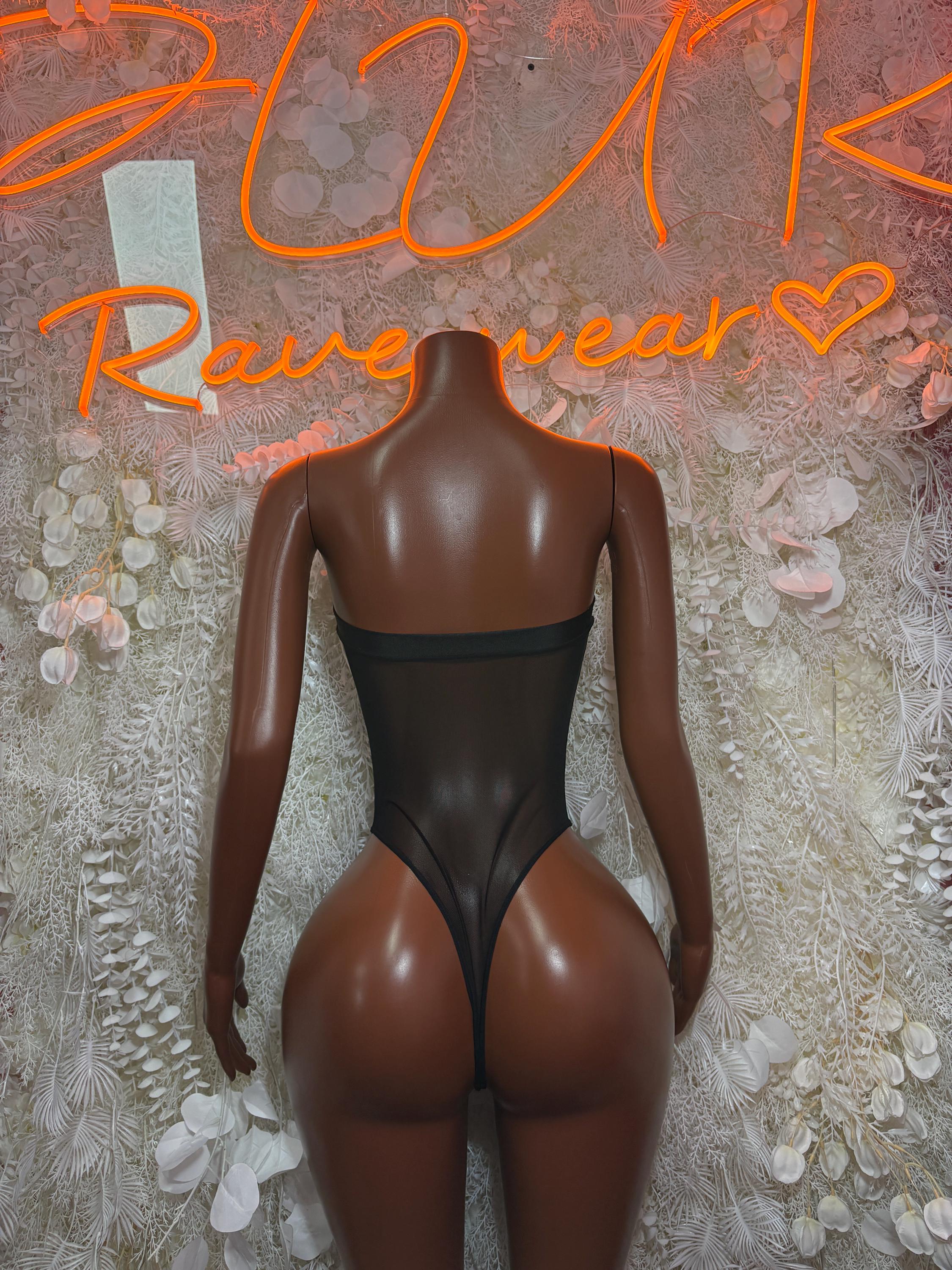 Black mesh bodysuit with open back and high-cut legs