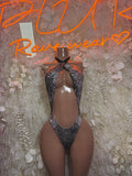 Metallic snake-print halter bodysuit with high-cut thong back and cutout front, dark silver