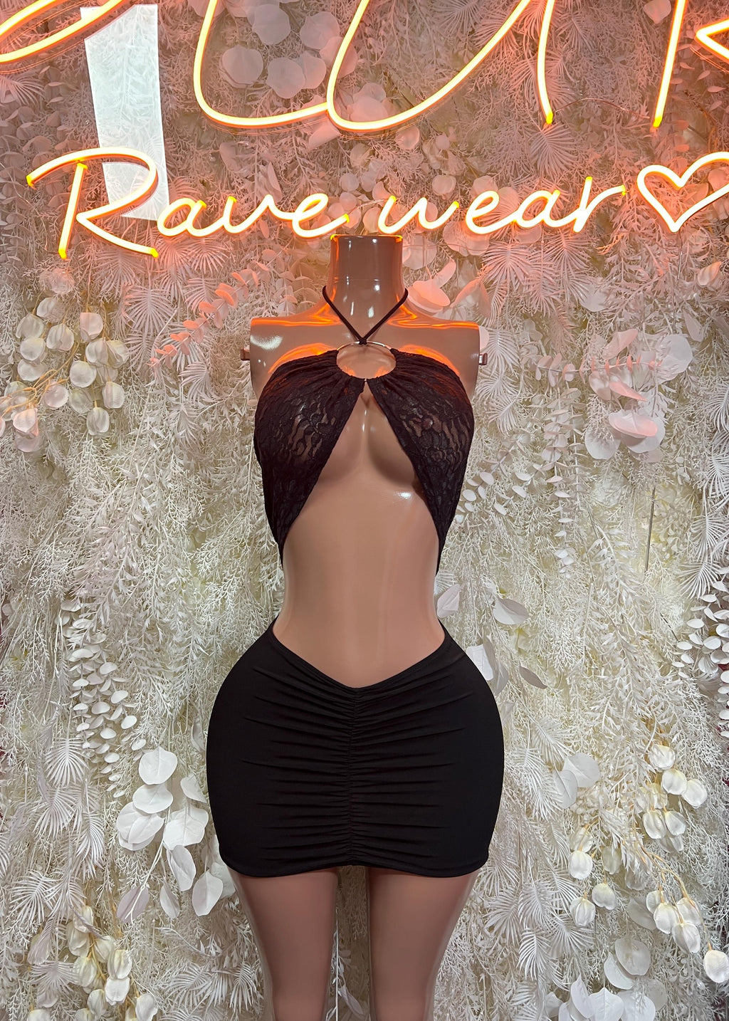 Black lace halter crop top and ruched mini skirt with front cutout