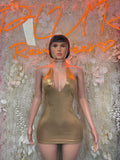 Metallic gold mini dress with halter neckline and choker-style collar, sleeveless