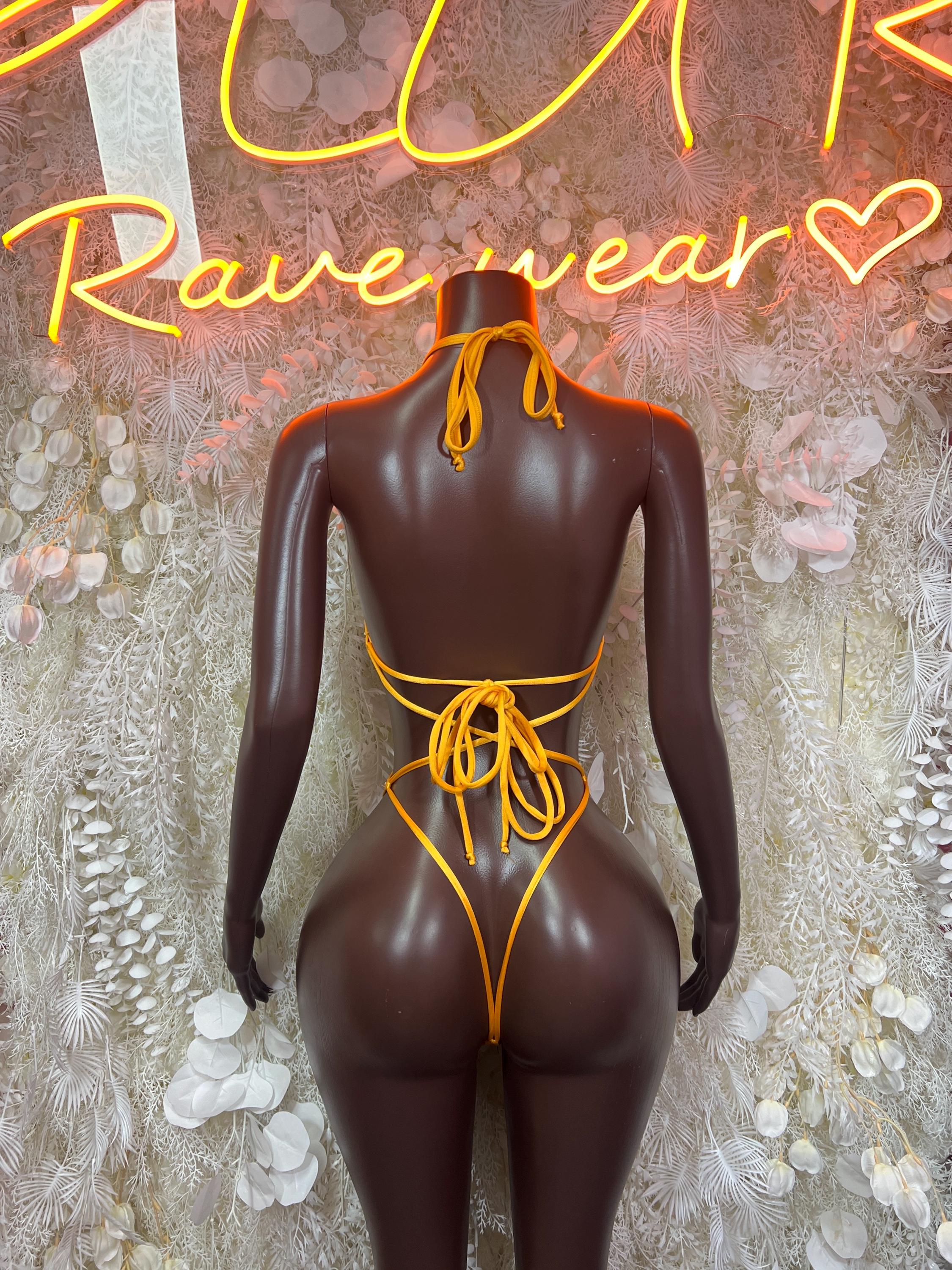 Women’s one-piece bodysuit, lace-up back with green and gold trim, black