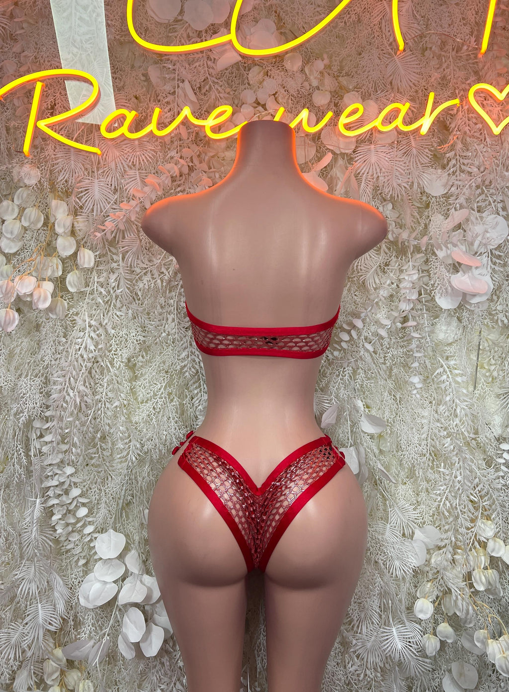 Red mesh bikini bottoms with wide back band and strappy side cutouts
