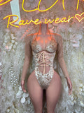 Champagne gold lace criss-cross cutout bodysuit with long sheer sleeves and V neckline