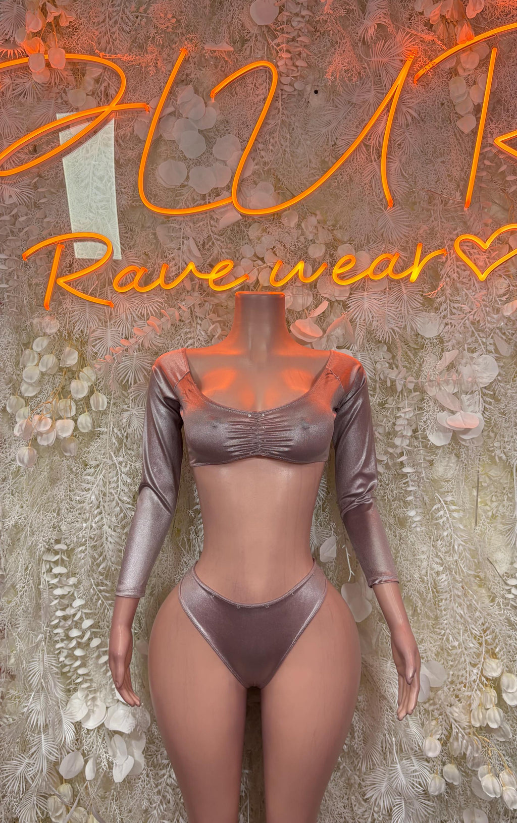 Rose gold metallic crop top and high-cut bottoms, long sleeves