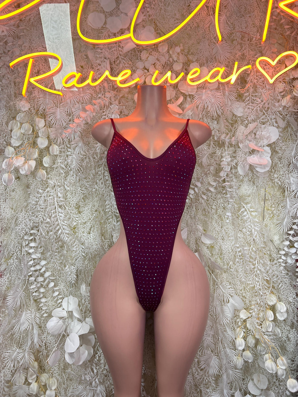 Maroon rhinestone bodysuit with thin straps, scoop neckline, high-cut leg