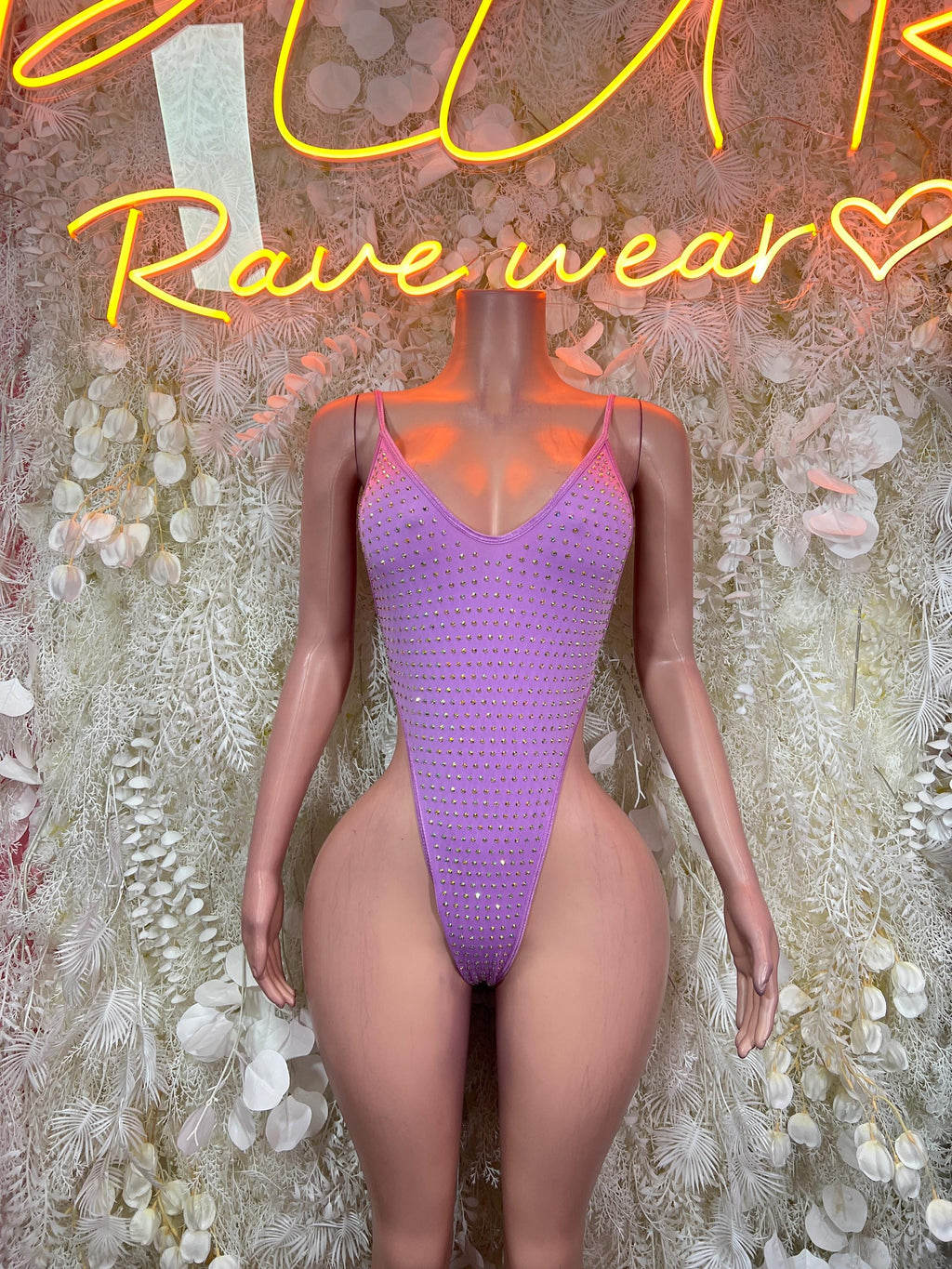 Purple rhinestone bodysuit with thin spaghetti straps, high-cut front