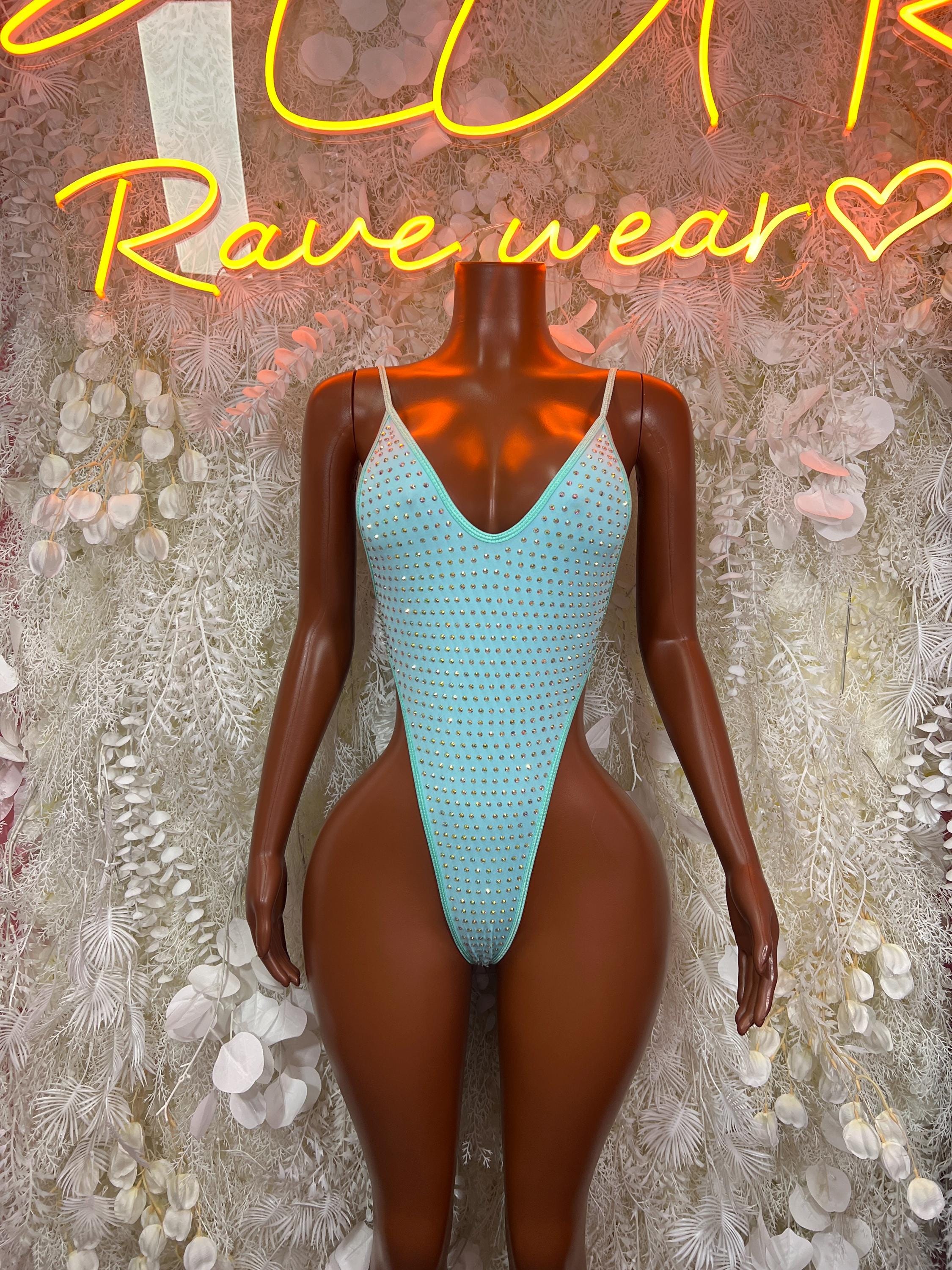 Teal rhinestone bodysuit, thin straps, high-cut one-piece with front V neckline