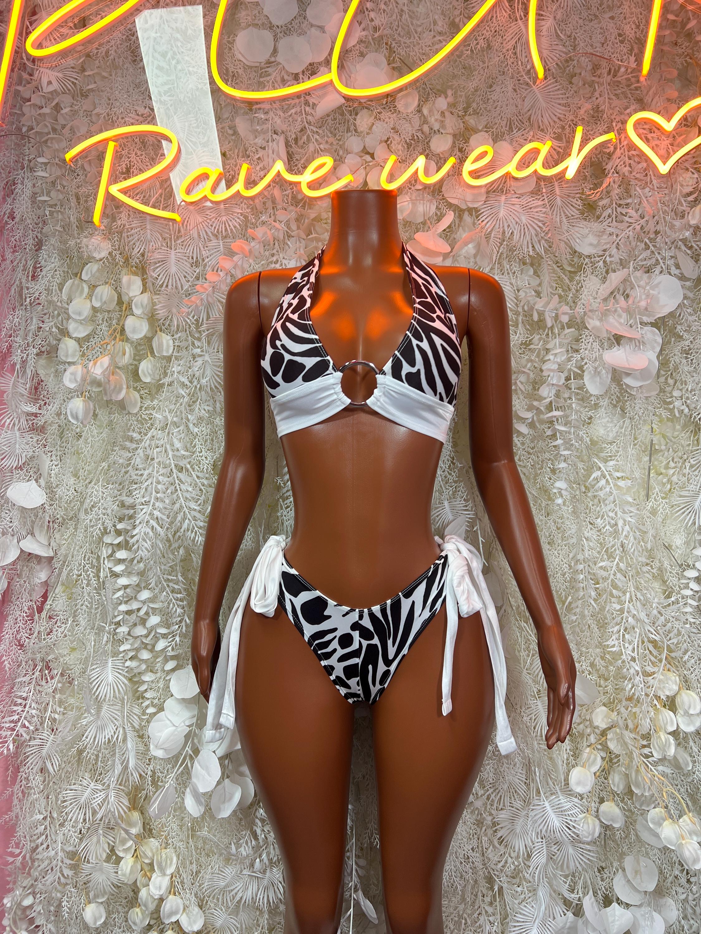 Zebra print two-piece swimwear with white tie-front top and high-cut bikini bottoms