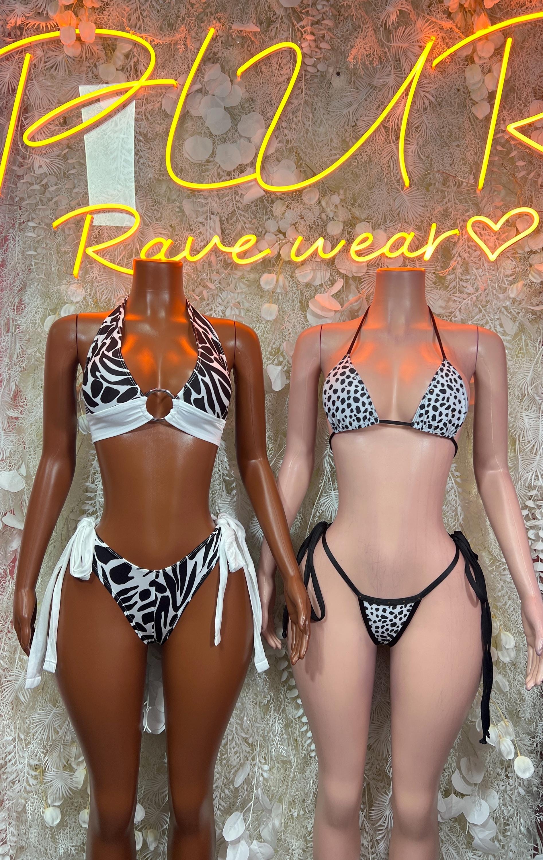 Two-piece polka dot bikini swim set on two models, triangle halter tops and string bottoms