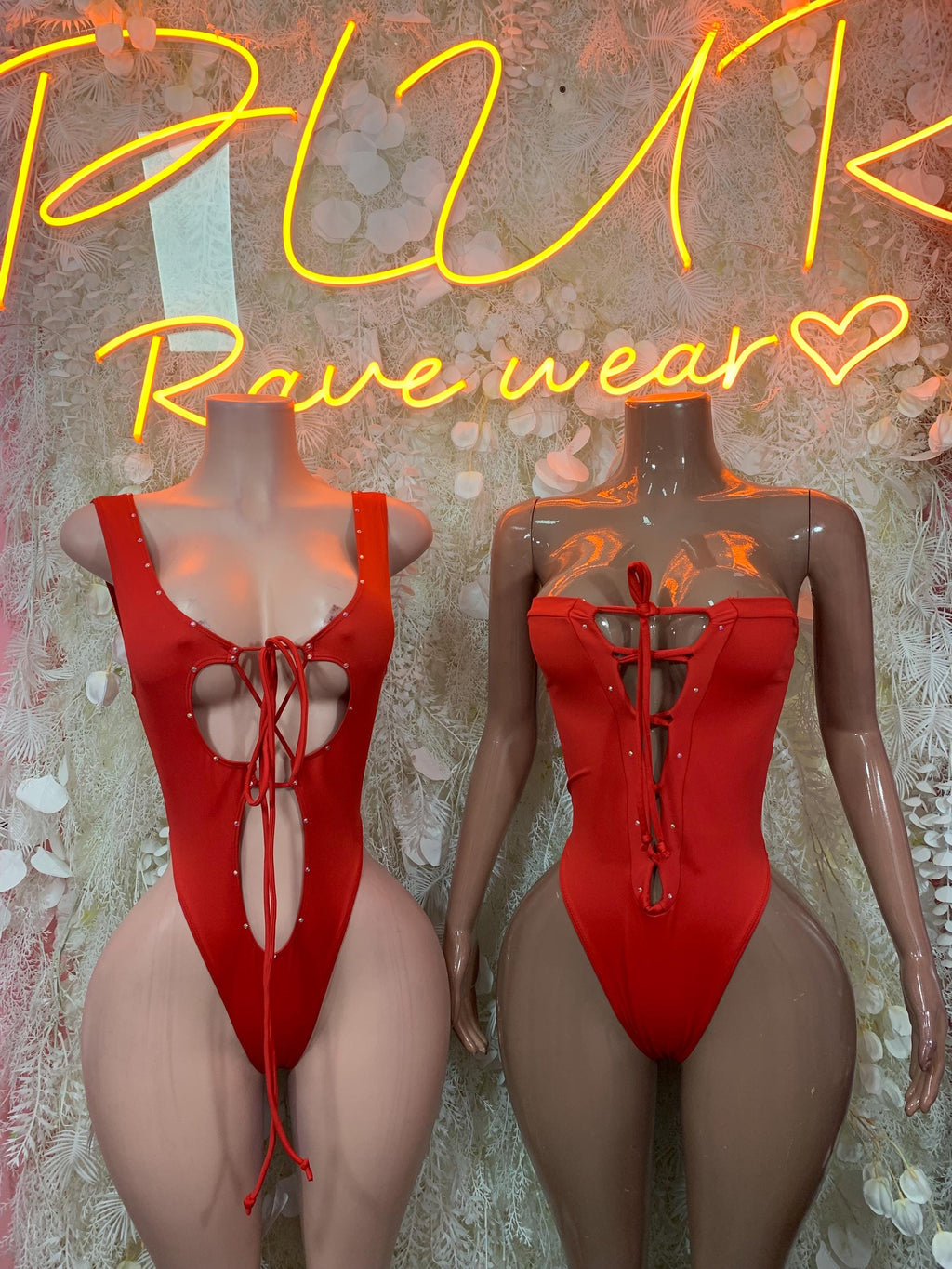 Red one-piece bodysuit shown front and back, with halter and lace-up details