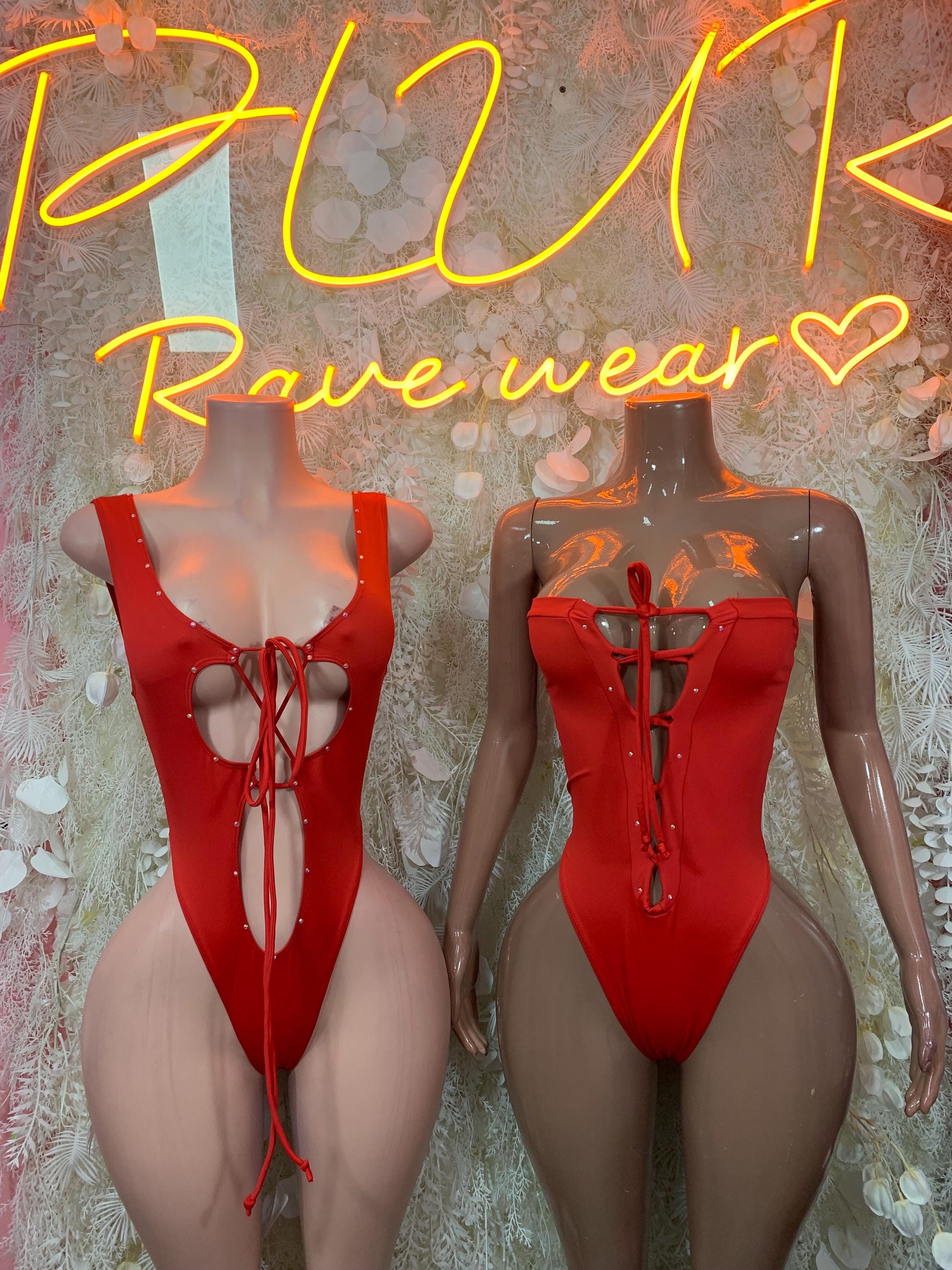 Red one-piece bodysuit shown front and back, with halter and lace-up details