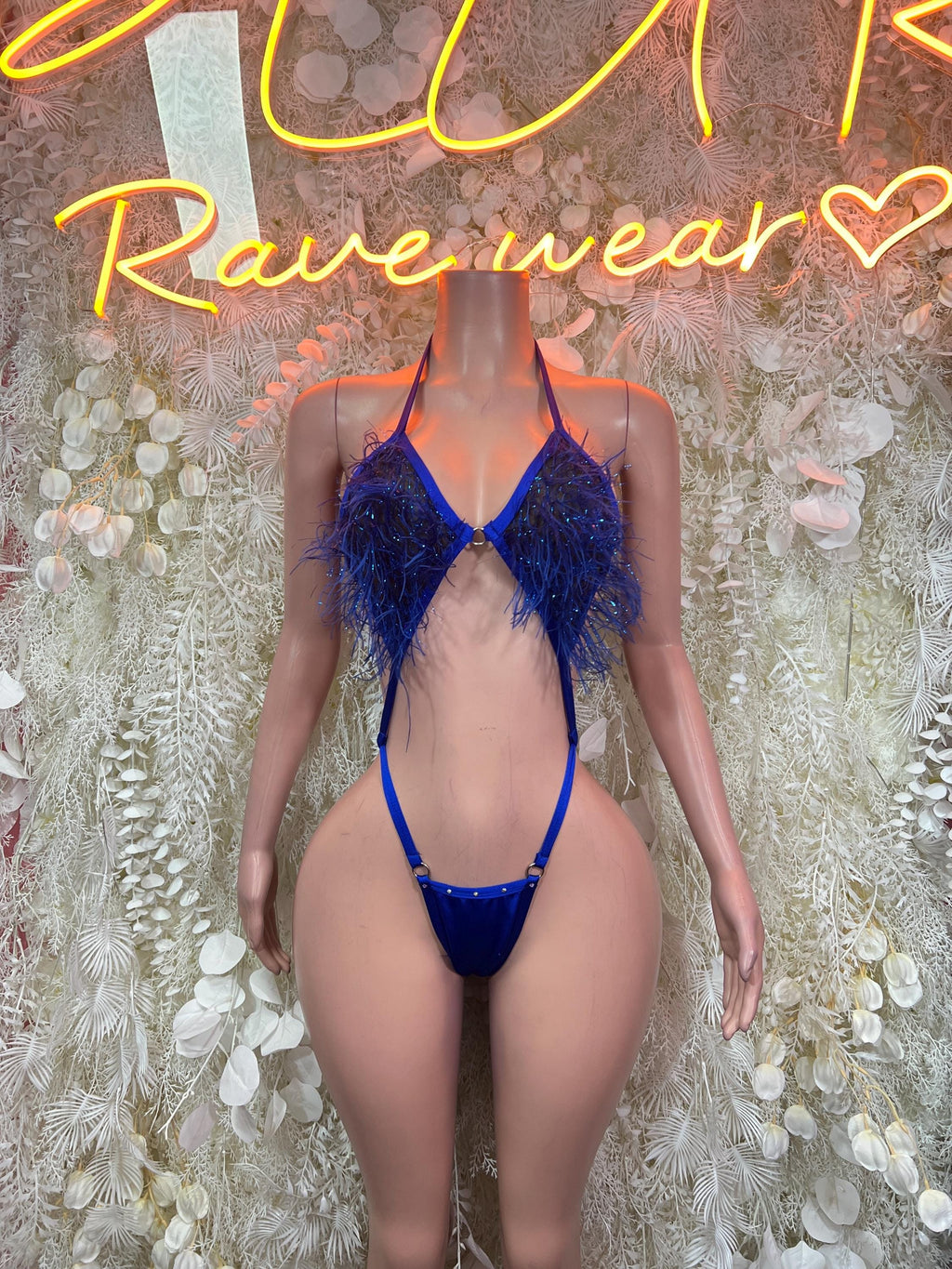 Blue feather-fringe bodysuit with V-neck, thong cut, and thin tie straps