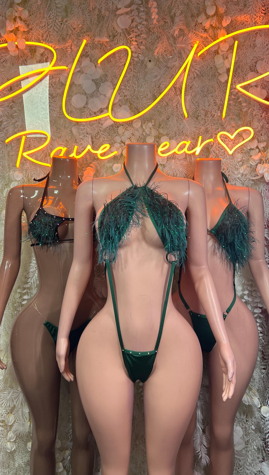Emerald green feather-fringe bikini with glitter boa fringe, front view.