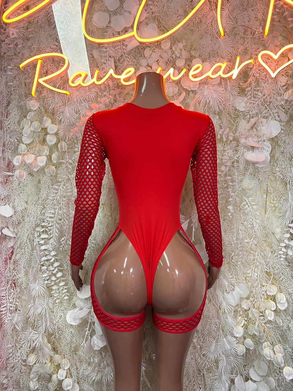 Red one-piece bodysuit with mesh sleeves and crisscross lace back cutout