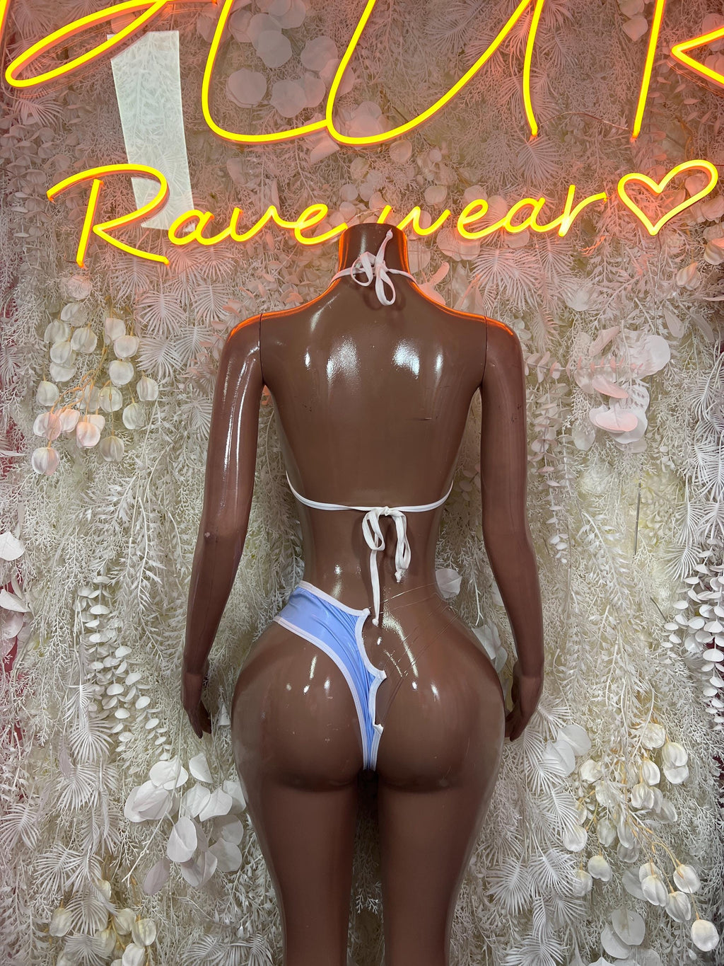 Light blue latex bikini from behind, halter ties and strappy high-cut bottoms