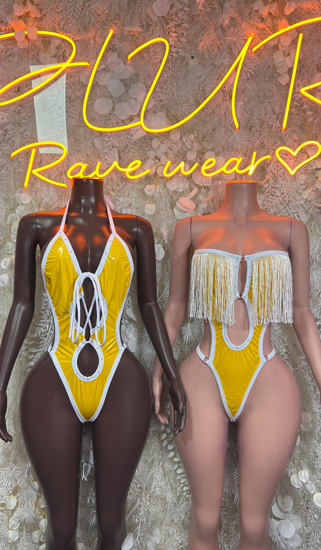 Yellow latex fringe bodysuit with white lace-up back and high-cut one-piece
