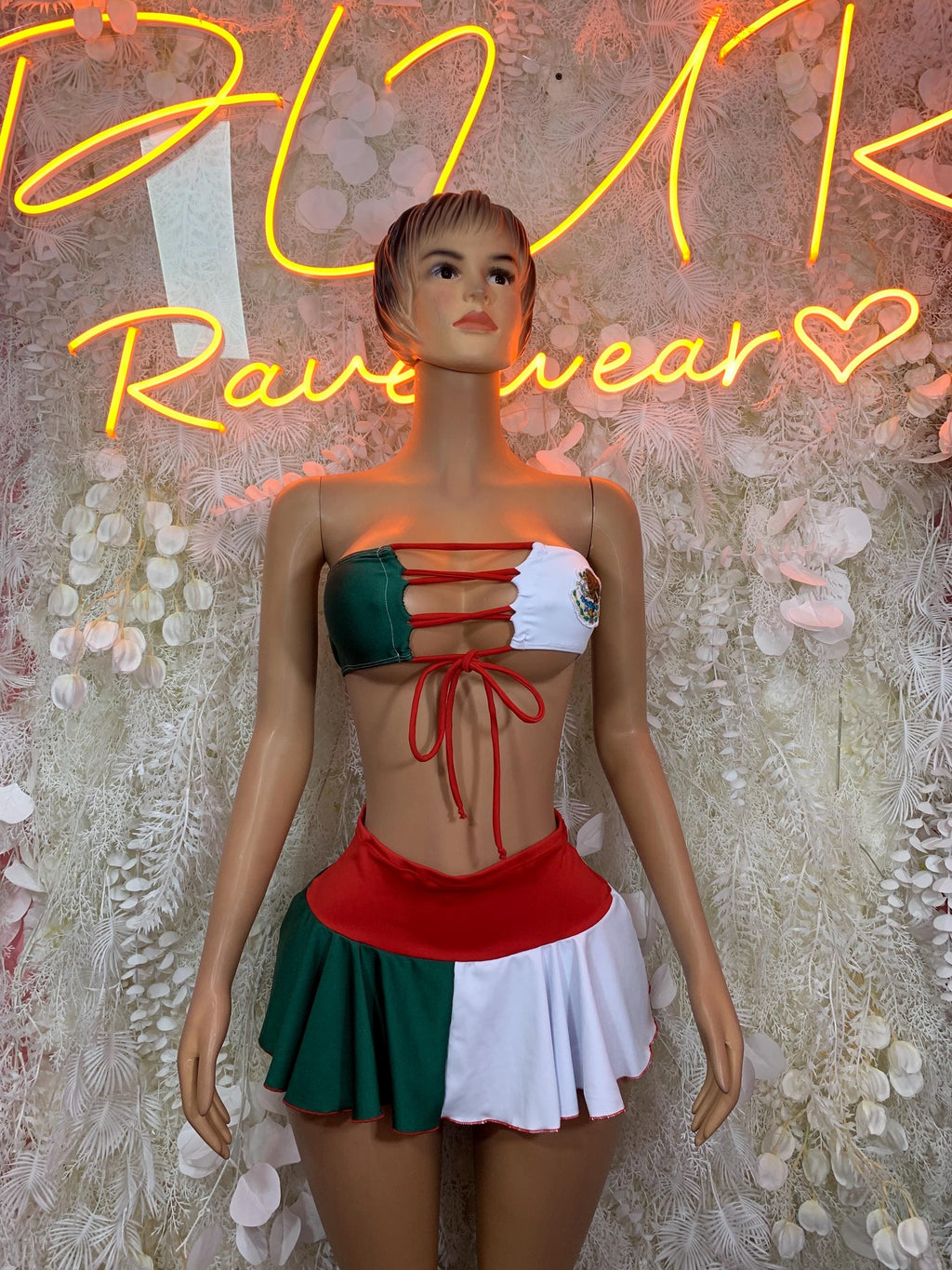 Two-piece rave dance set: green/white bandeau with red lace-up and red flared mini skirt