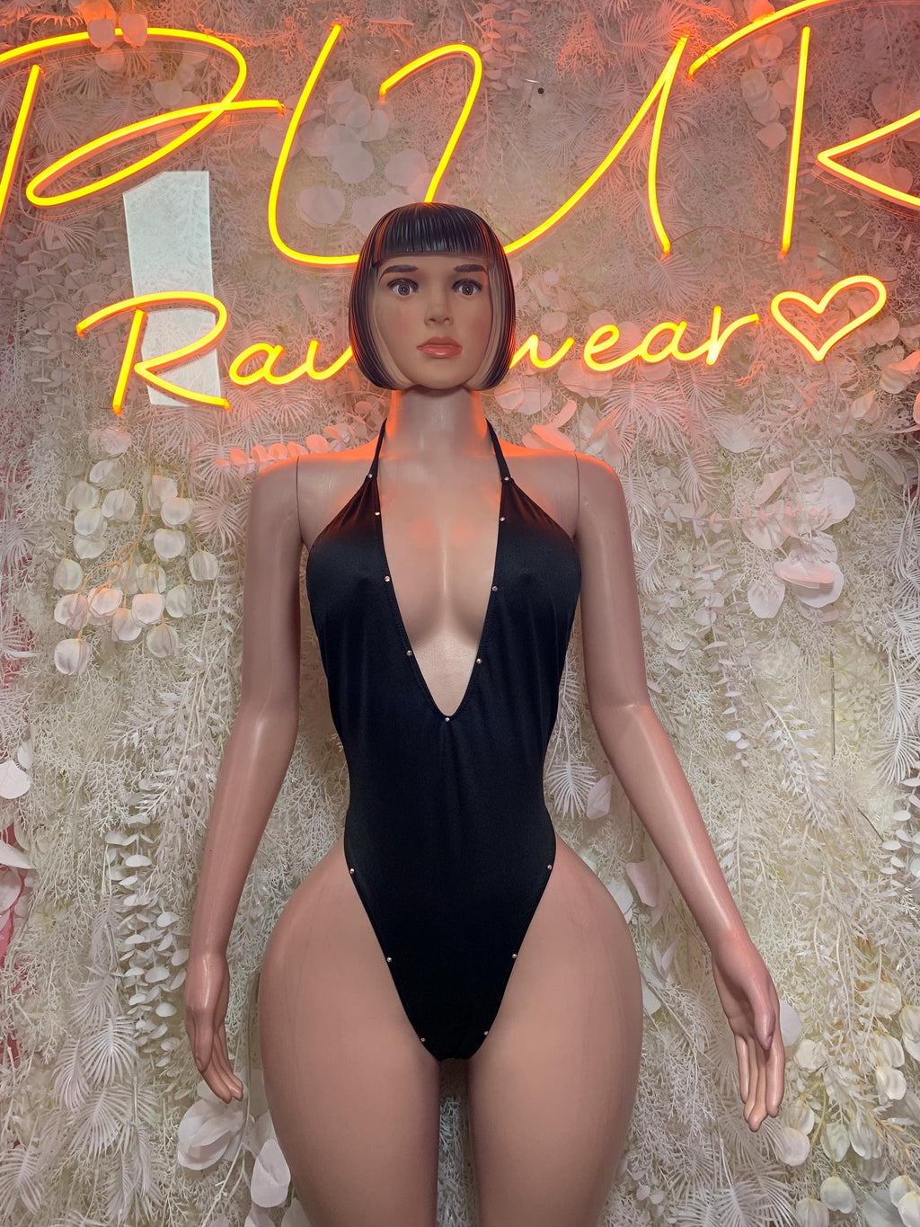 Black rhinestone halter bodysuit with deep V plunge and high-cut thong, front