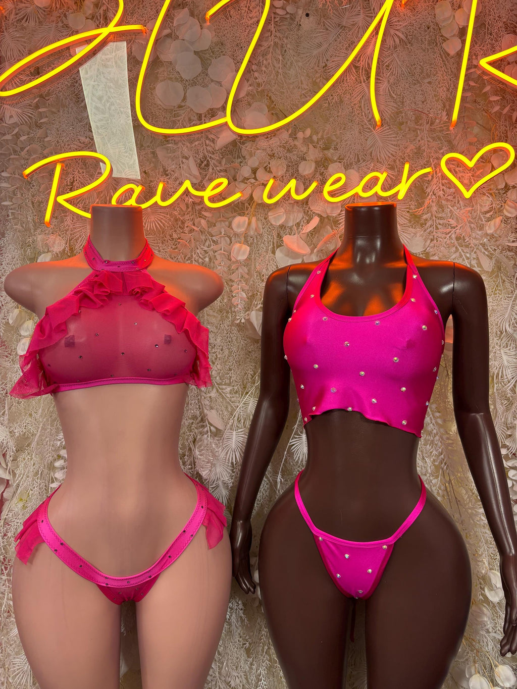 Pink two-piece dancewear set on two models, halter tops and ruffle bottoms