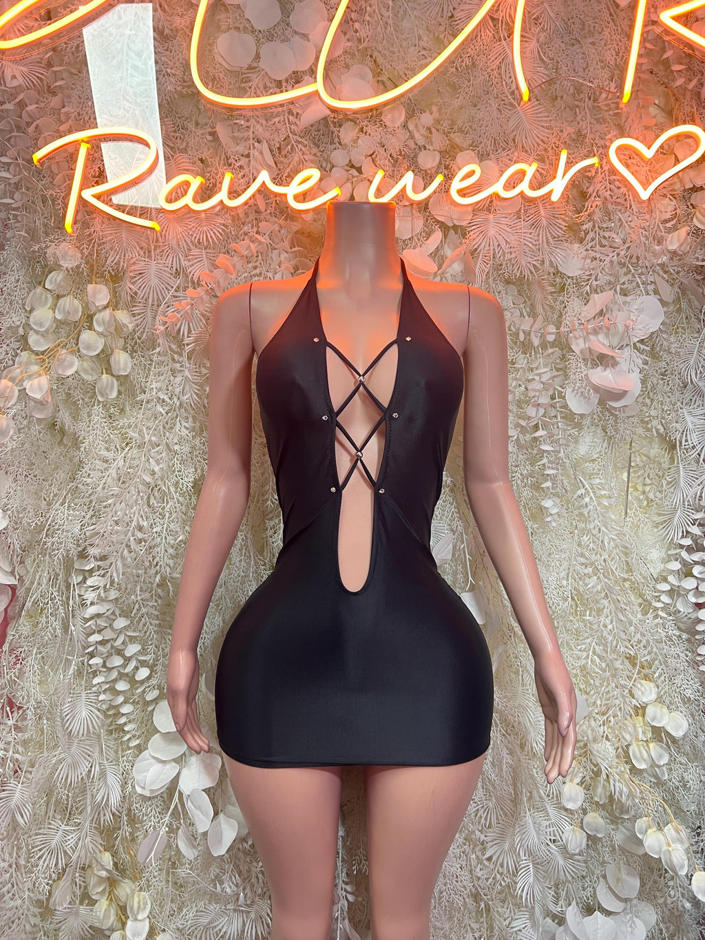 Black halter mini dress with crisscross lace-up front and rhinestone accents