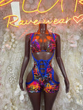 Multicolor paint-splatter bodysuit with blue straps and lace-up back, sleeveless