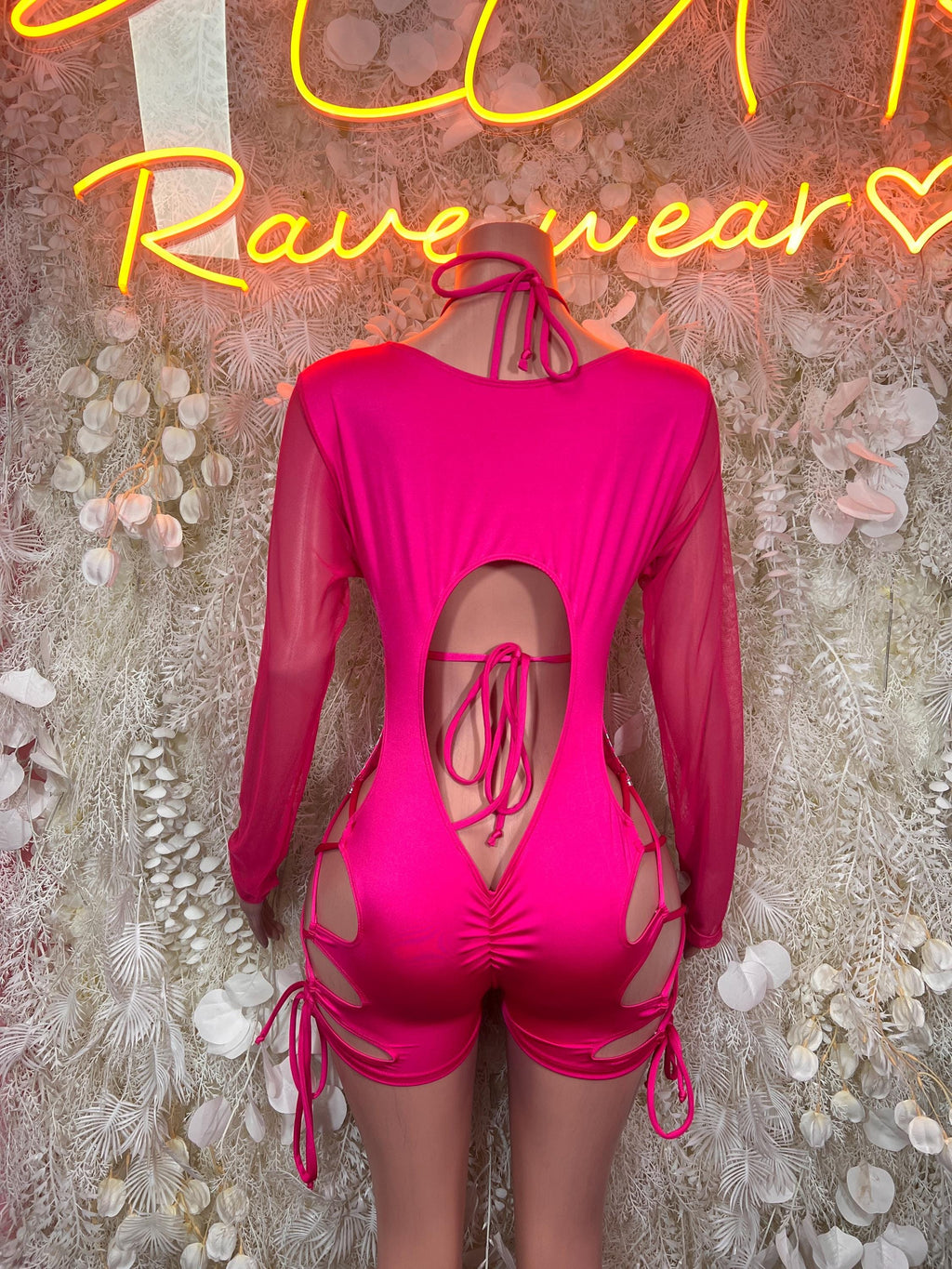 Hot pink metallic cheetah bodysuit with tie-back strings, long sleeves, side cutouts