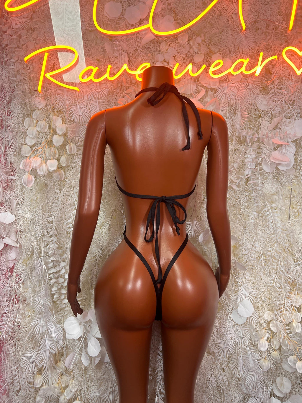 Blue leopard print monokini bodysuit with black crisscross back straps