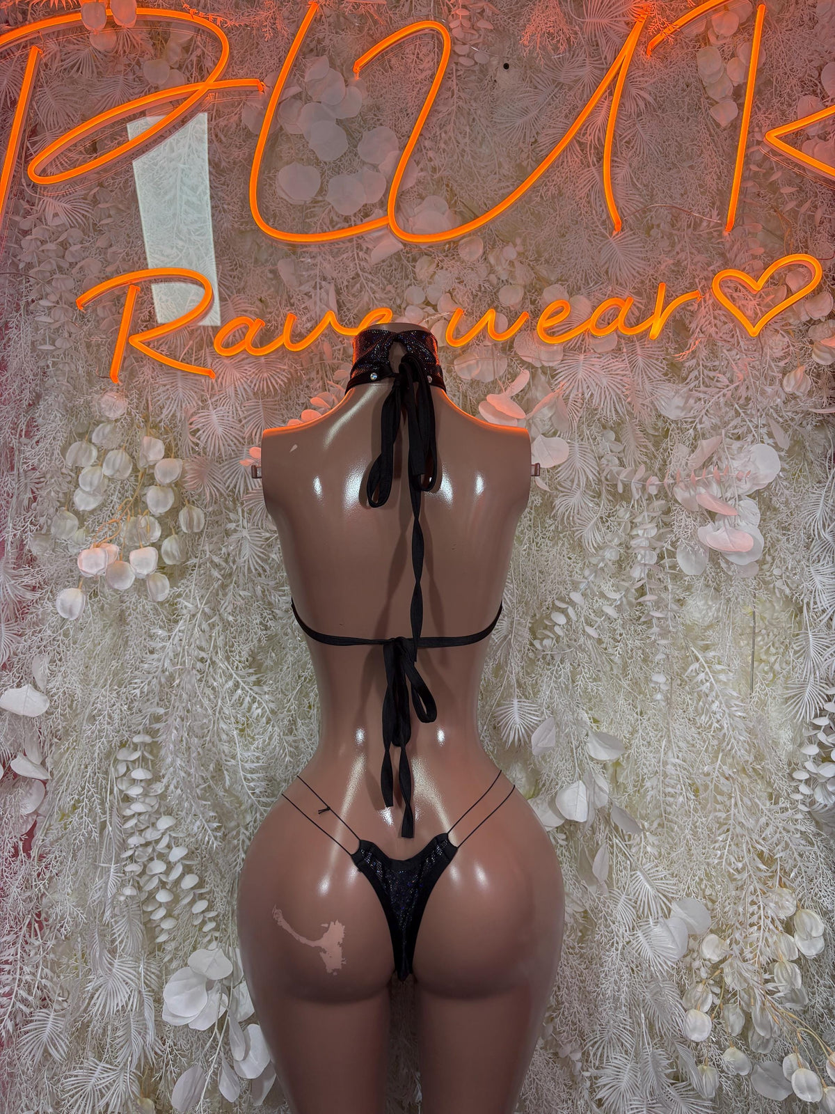 Black lace-up halter crop top with matching thong, back view