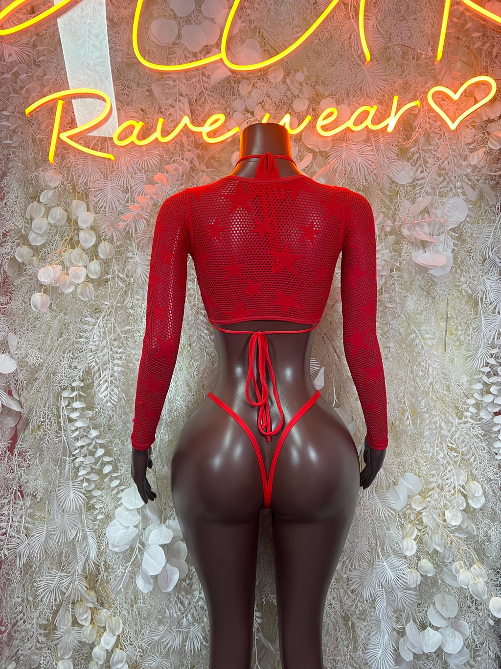Red fishnet mesh long-sleeve bikini top with lace-up back and thong bottom