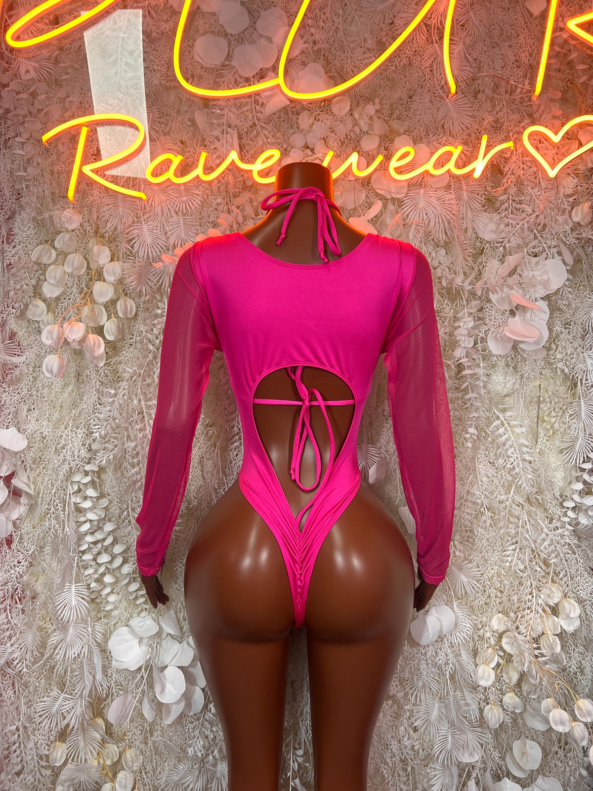 Hot pink metallic cheetah bodysuit with long sleeves and crisscross back lacing