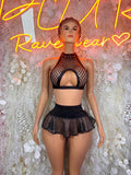 Black fishnet halter crop top with rhinestone choker and ruffle skirt festival outfit