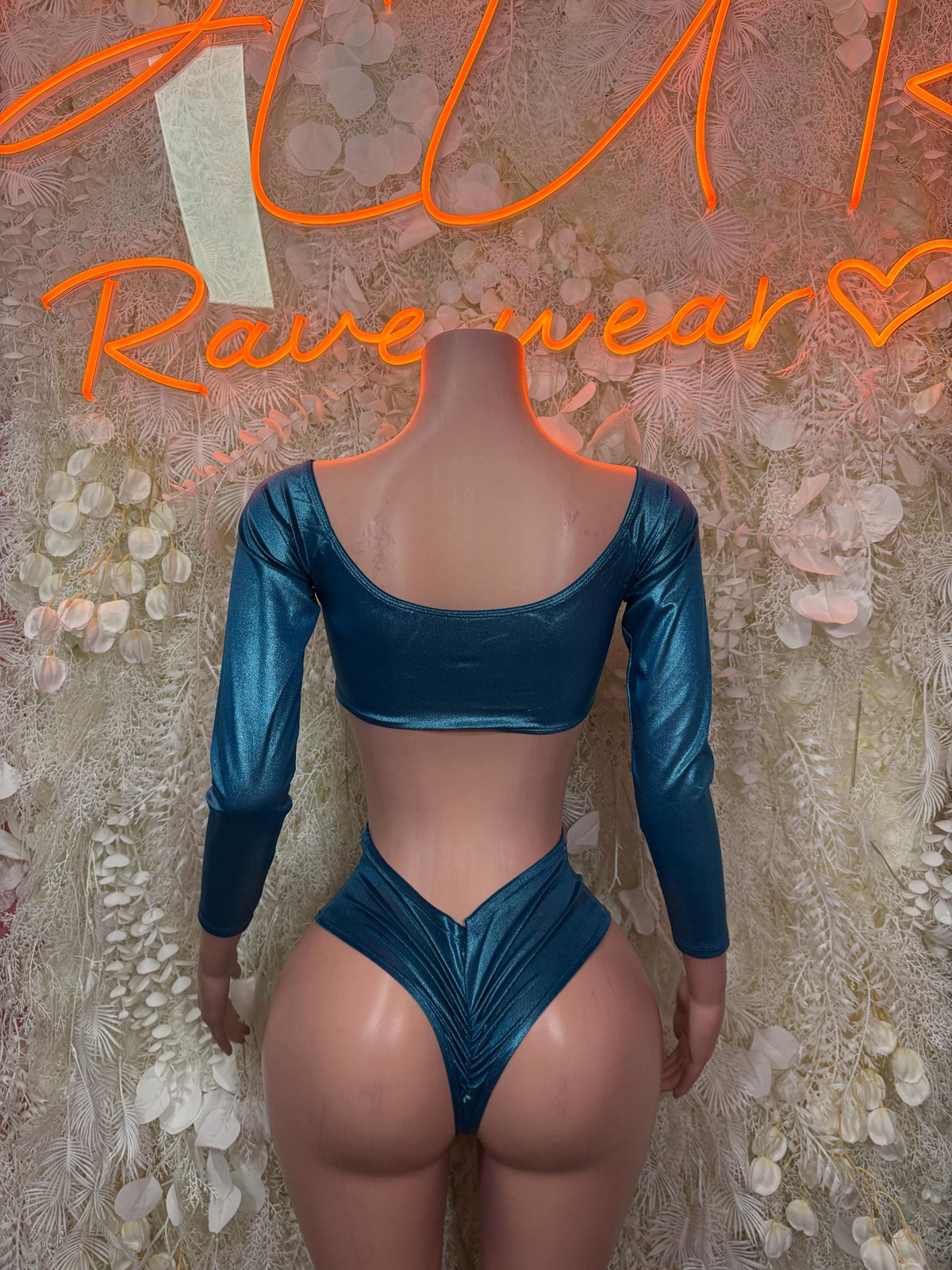 Teal metallic long-sleeve crop top with high-cut thong, matching set