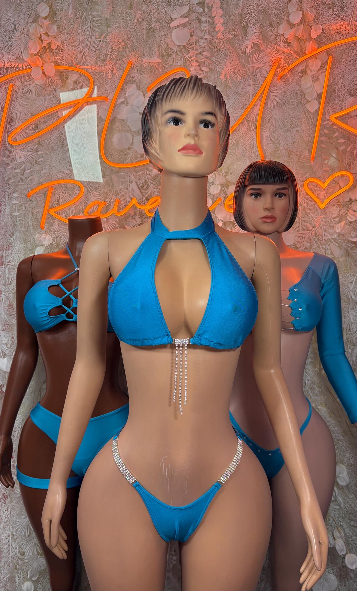 Blue halter triangle bikini set with crisscross bandeau and high-cut thong garters