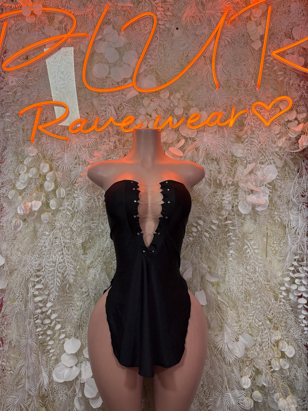 Black strapless lace-up front high-cut bodysuit with plunging neckline