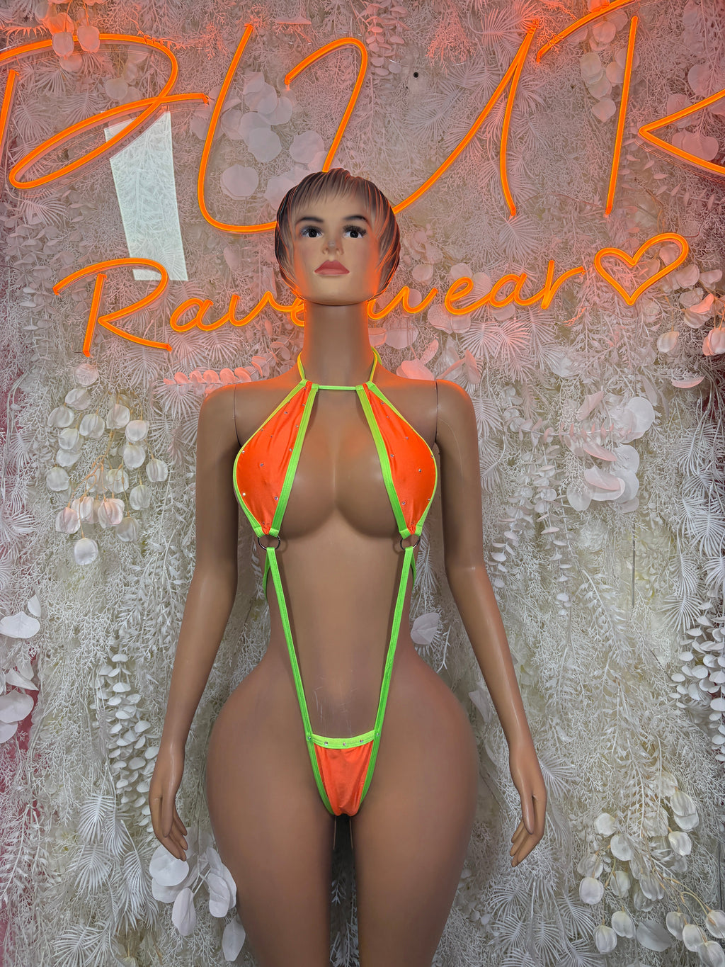 Neon orange and green cutout bodysuit with halter neck, front view