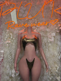 Cutout bodysuit in olive metallic, high-cut legs, thong back with central front cutout.